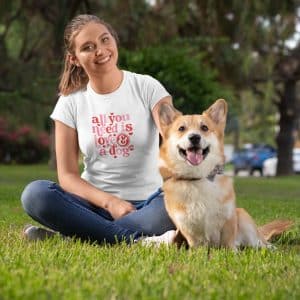 Woman Wearing All You Need is Love and a Dog Tshirt White